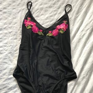Black one piece swimsuit with embroidered roses